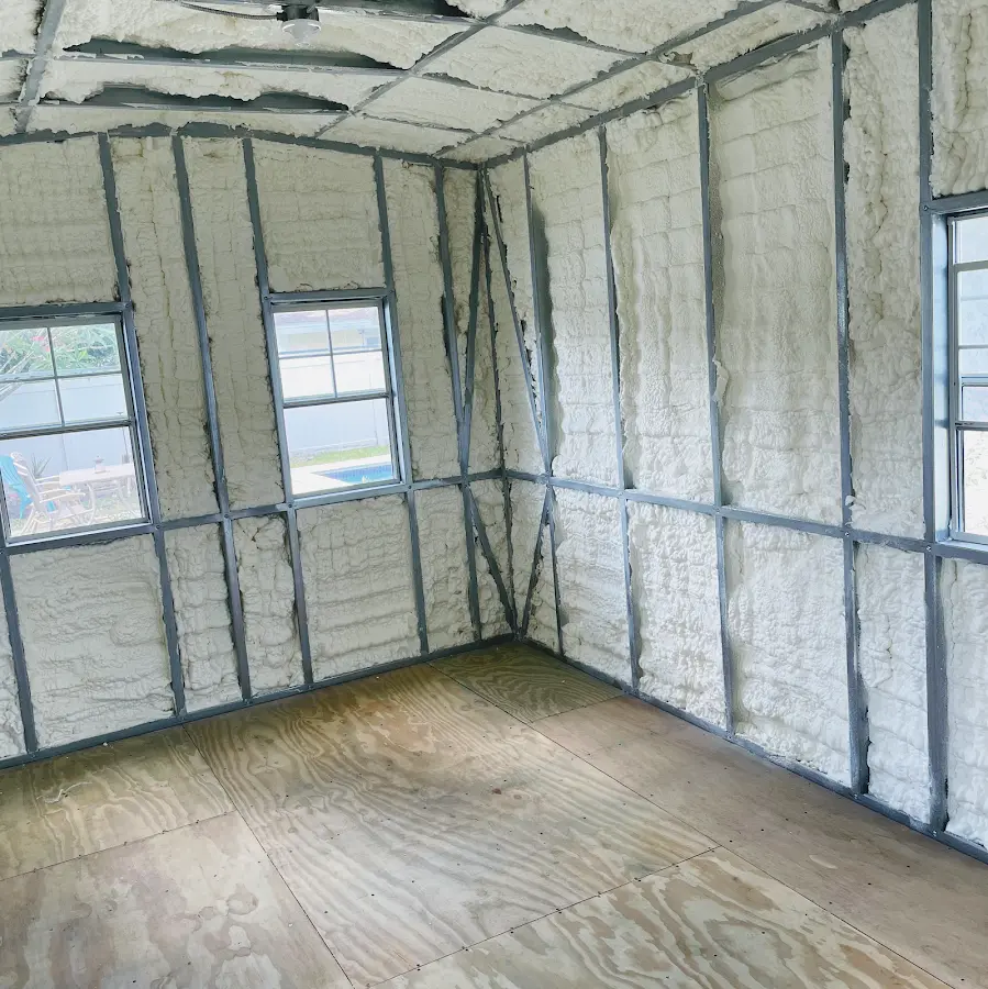 Closed-cell spray foam insulation applied to wall cavities in a residential project in Bainbridge